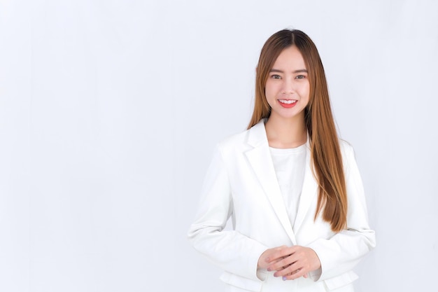 Portrait of asian businesswoman in white suit isolated on white background