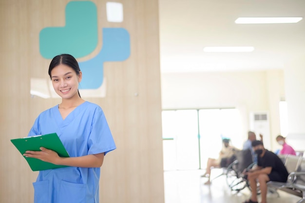 Photo portrait of asian confident smiling female nurse working in hospital health care concept x9