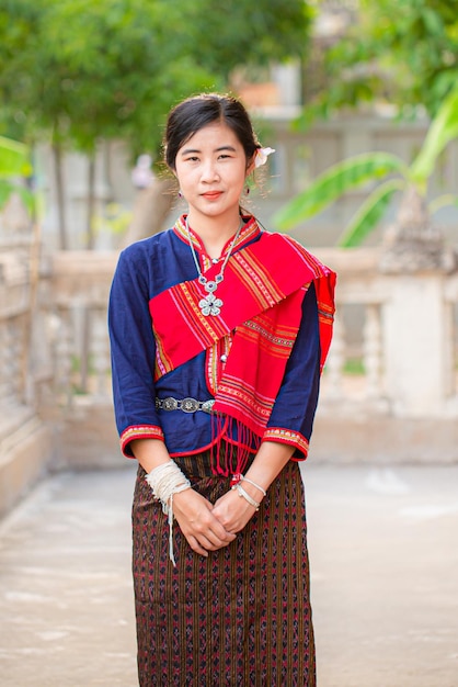 Portrait of asian girl with Thai local traditional dress famous in countryside of ThailandLadies