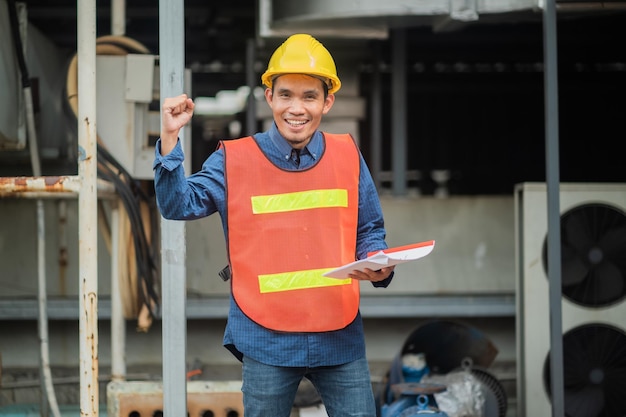 Portrait of Asian man engineer construction concept Asian man engineer in construction site Worker in building construction site worker helmet confident copy spec worker in safety suit at work