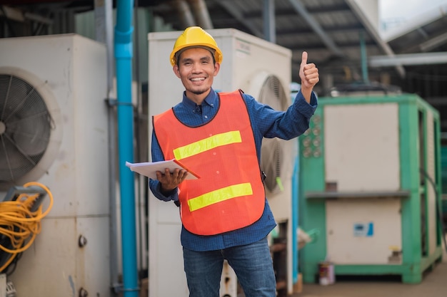 Portrait of Asian man engineer construction concept Asian man engineer in construction site Worker in building construction site worker helmet confident copy spec worker in safety suit at work