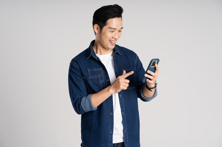 Photo 白色背景上的亞洲男人的肖像