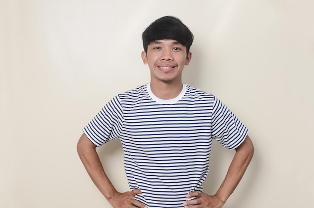 Portrait of asian man in striped shirt with smiling face