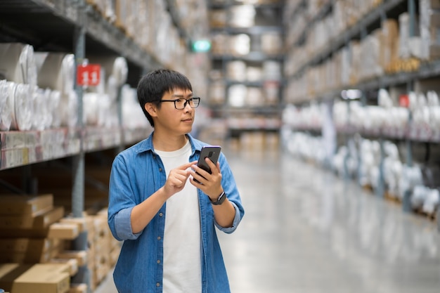 Portrait Asian men, staff, product counting Warehouse Control Manager