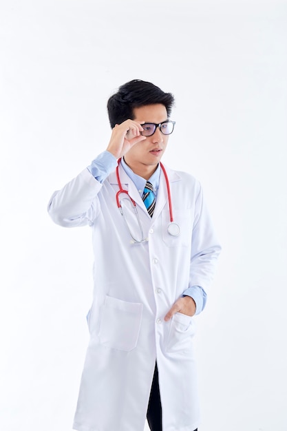 Portrait Asian Thai medical male doctor on white wall