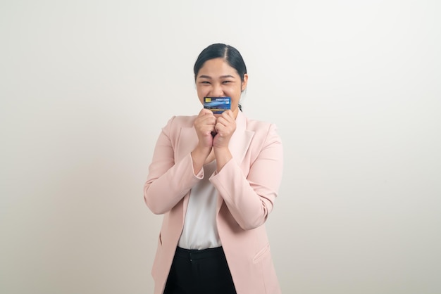 portrait Asian woman holding credit card with white background