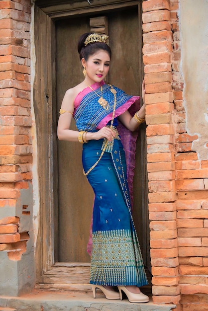 Portrait of asian woman wear ancient thai dress styleThailand people Thai traditional dress pay respect