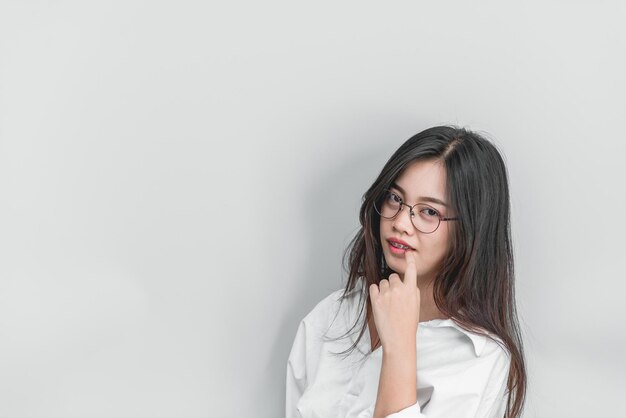 Portrait of asian woman wear white shirt with glasses on white backgroundModern business woman concept