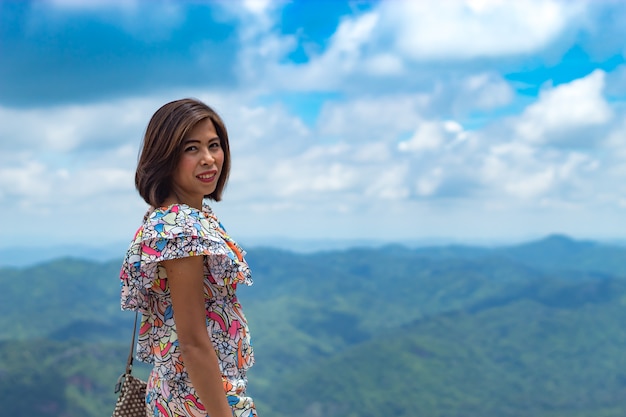 Portrait of Asian women and views of the mountains.