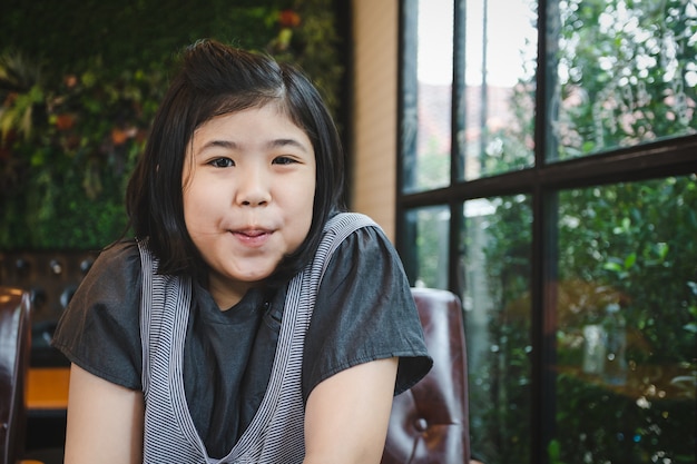 Portrait asian young girl in restaurant shop