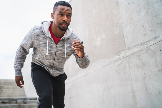 Portrait of an athletic man running.