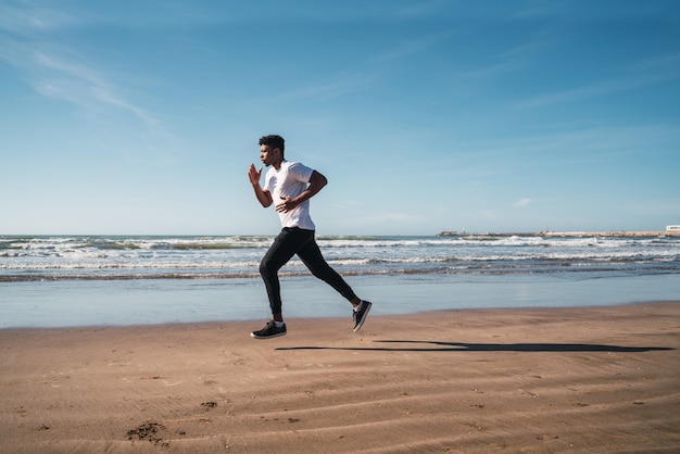 Portrait of an athletic man running