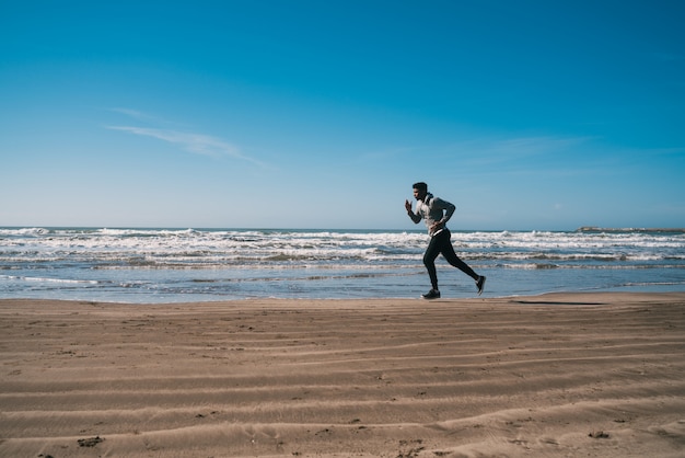 Portrait of an athletic man running