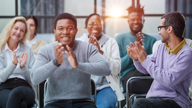 Portrait of attentive students on training session in auditorium