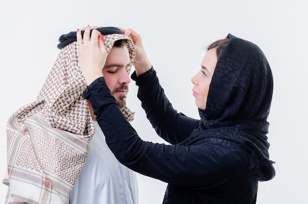 Portrait of attractive arabic coupledressed middle eastern way