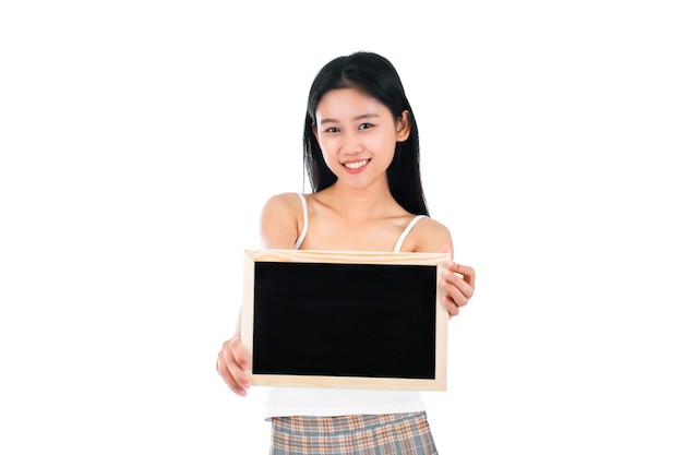 Portrait of attractive asian young woman with beauty skin and face holding blank blackboard.