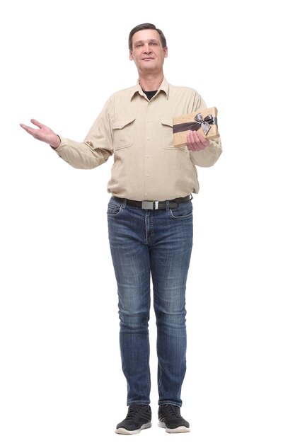 Photo portrait of an attractive casual man giving present box and looking at camera