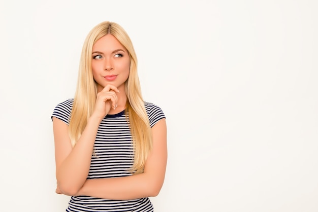 Portrait of attractive minded woman dreaming