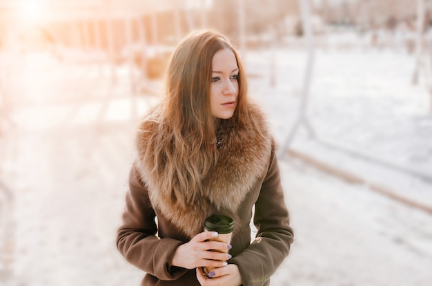 Portrait of attractive redhead girl