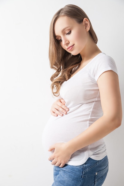 Portrait of attractive young woman waiting for baby