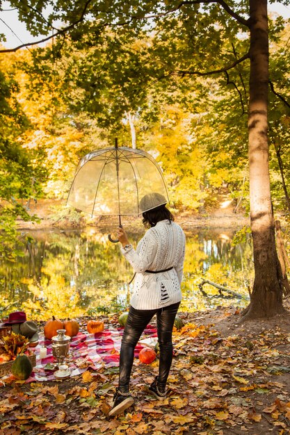 Portrait of autumn girl with leaves