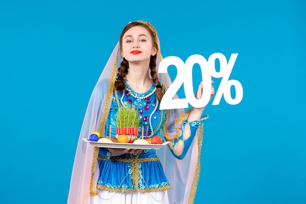 portrait of azeri woman in traditional dress with xonca blue wall dancer spring novruz ethnic color