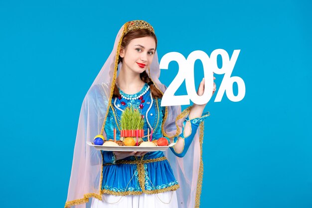 portrait of azeri woman in traditional dress with xonca blue wall dancer spring novruz ethnic colors