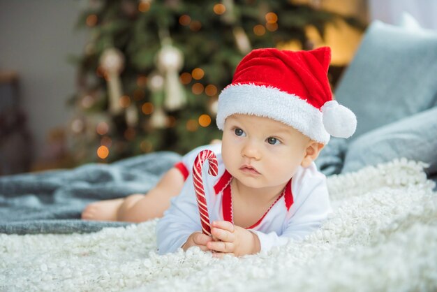 Portrait of a baby boy in Santa hat