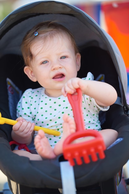 portrait of baby in carriage