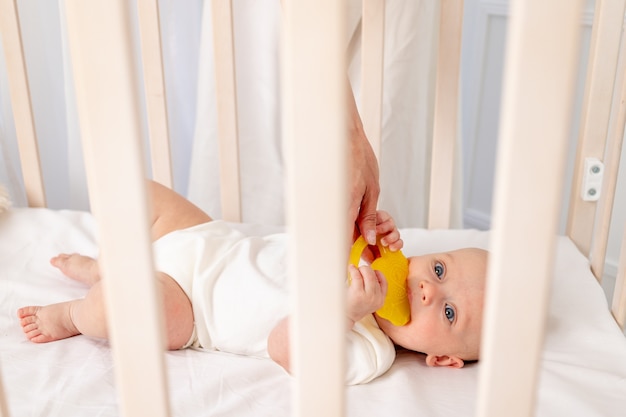 portrait baby in the crib