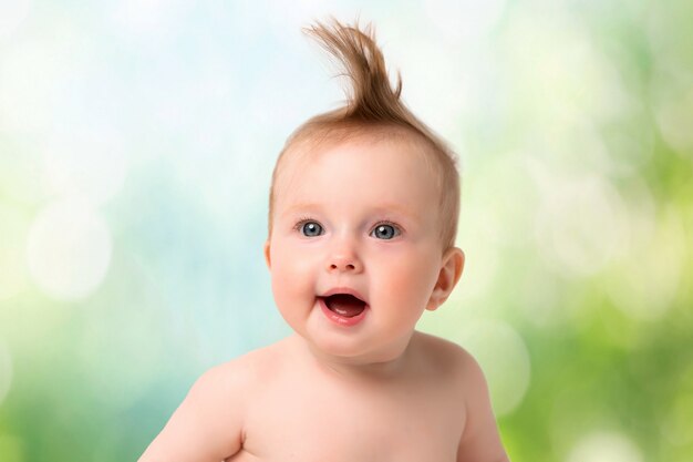 Portrait of baby on a light background