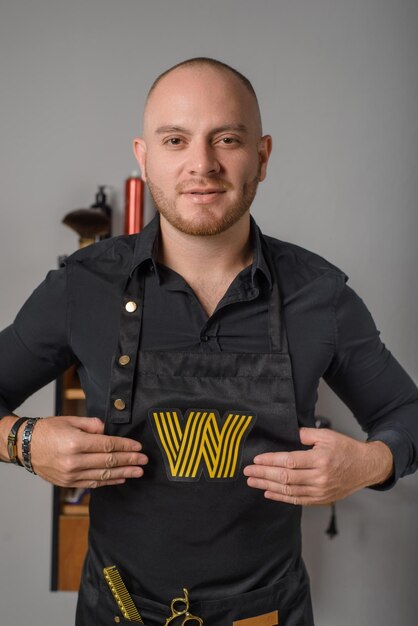 Portrait of a barber at his workplace