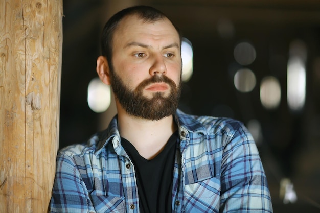 portrait of a bearded man in a rustic style