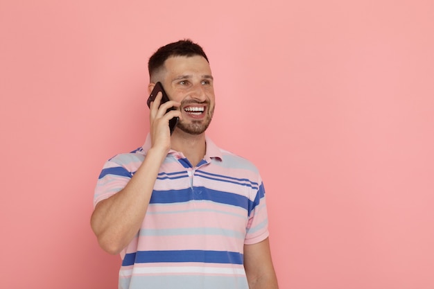 Portrait bearded man talking on the phone