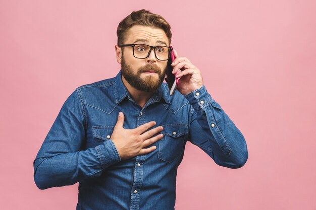 Portrait bearded man talking on phone