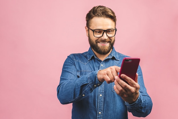 Portrait bearded man using phone