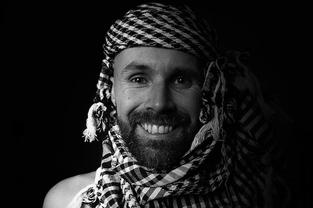 portrait of a bearded man wearing a hijab