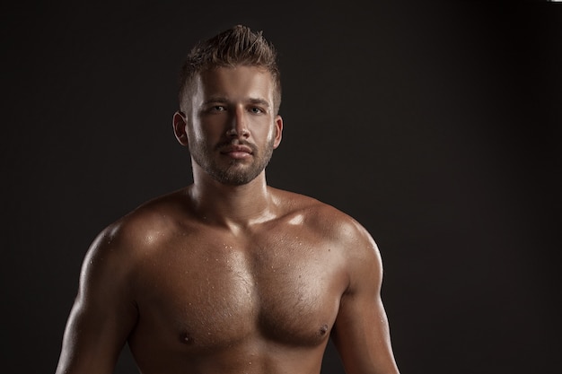 portrait bearded muscular young man