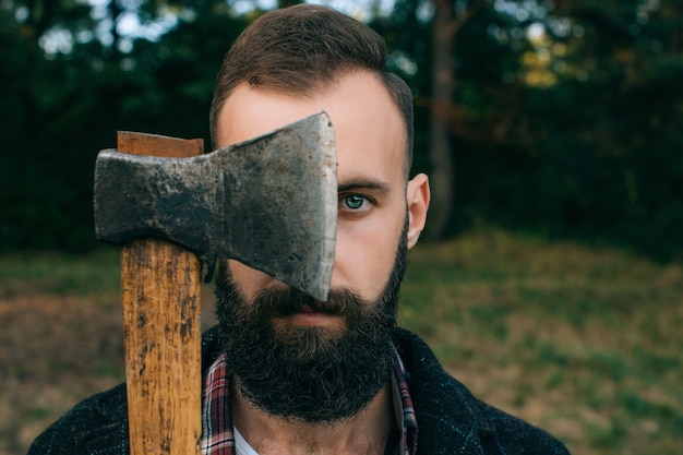 Portrait bearded woodcutter hipster
