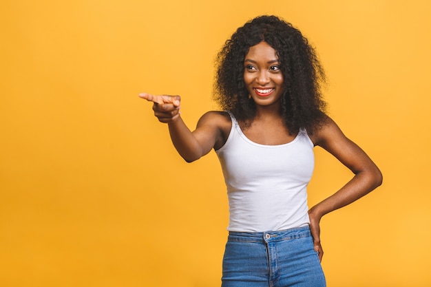 Portrait of beautiful african american woman pointing