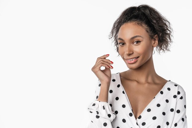 Portrait of beautiful african american young woman with curly hair