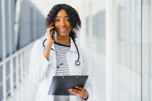 Portrait of beautiful afro american female medical intern in modern office