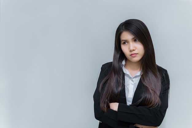 Portrait of beautiful asian business woman wear white shirt on white backgroundThailand peopleWoman think concept