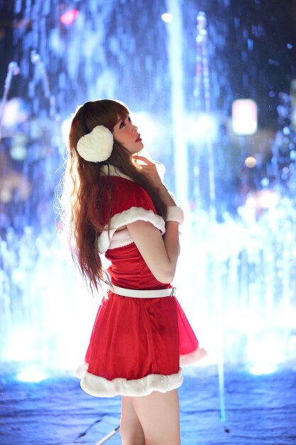 Portrait of beautiful asian female santa in christmas