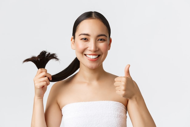 Portrait of beautiful Asian girl posing