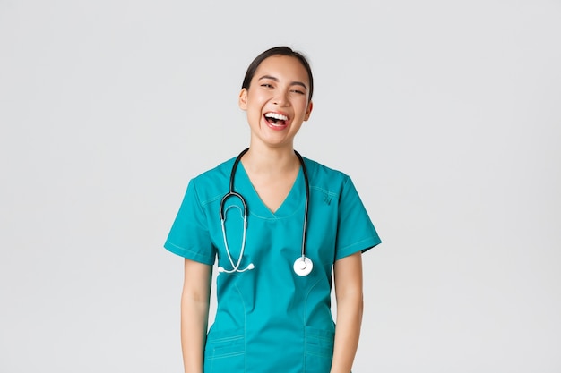 Portrait of a beautiful Asian nurse posing