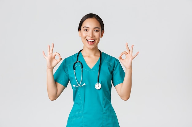 Portrait of a beautiful Asian nurse posing