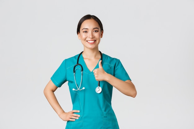 Portrait of a beautiful Asian nurse posing