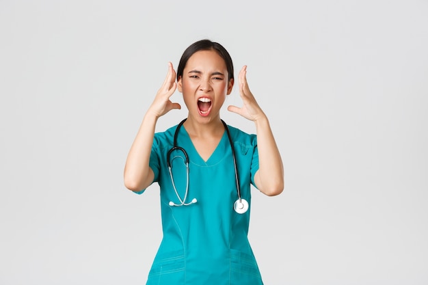 Portrait of a beautiful Asian nurse posing