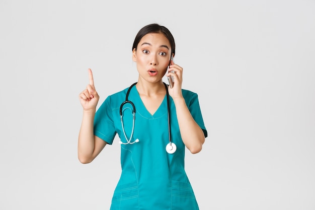 Portrait of a beautiful Asian nurse posing